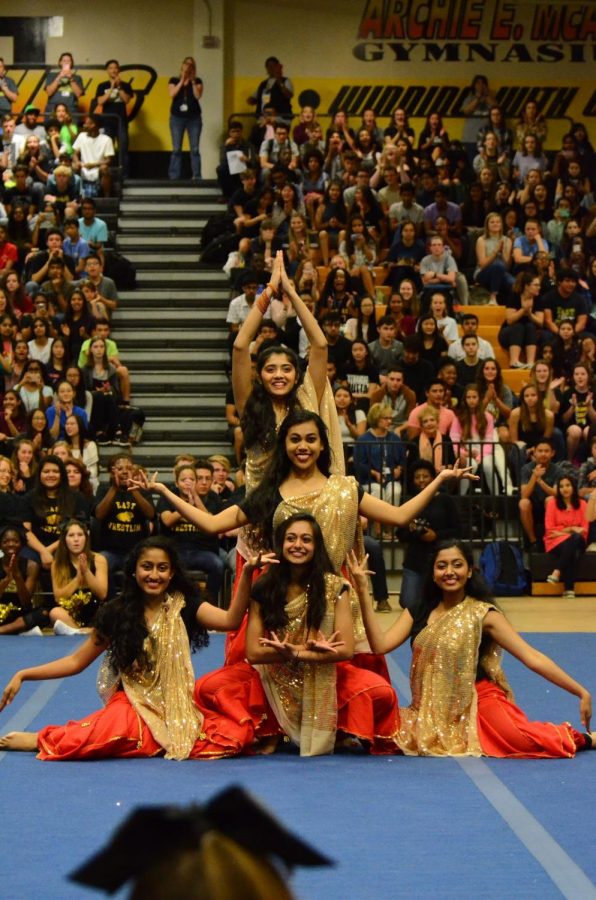 Performance Rush: Manisha Abraham, Kareena Senghani, Nivetha Murali, Devanshi Parikh, Grace Geevarghese at the end of their first performance during the first pep rally.  After their performance, them members felt a rush of adrenaline and were touched, seeing the school’s positive reaction to them.  “It was scary performing in front of the whole school,” Manisha said, “but it was also cool to see everyone cheering for us.”
