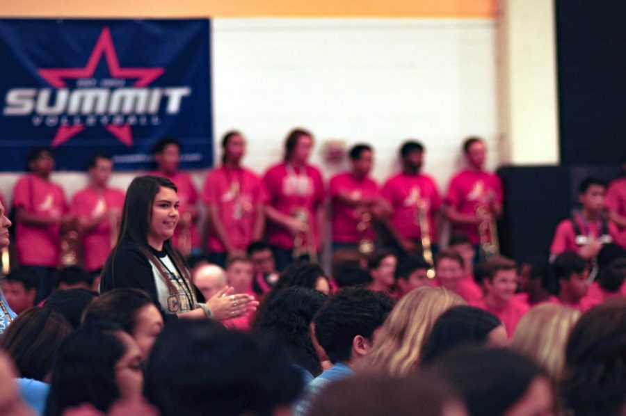 Proud Coach: Rose smiles on Sept. 13 as she watches her new cheer team perform at the pep rally. This was their first performance of the year, so she felt excited to see her cheerleaders show the school what they’re capable of.
