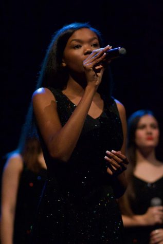 Junior Sound Invention member Klarke Pipkin sings at the jazz show Dec. 6.  
