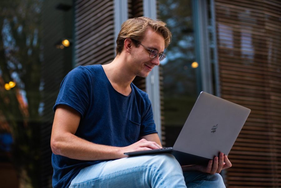 selective-focus-photo-of-man-using-laptop-1438081