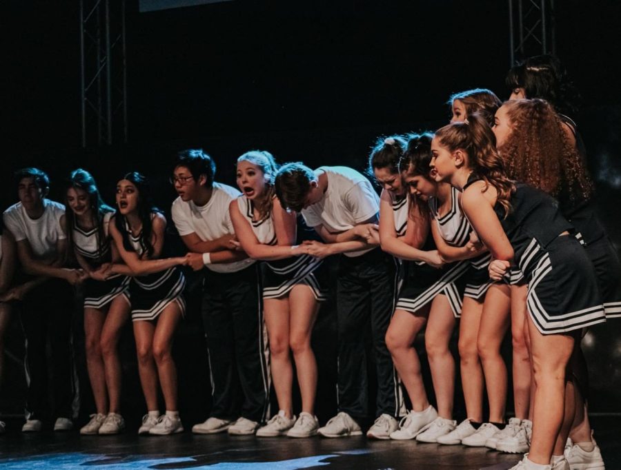 Bow out: Student actors in the musical "Bring It On" link arms and bow together. The show marked the last musical for many seniors. “It’s not like we just have next year to make it better,” Atwell said. "This is it." 