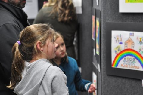 Prideful Pair: Plano ISD students view artwork at the annual Martin Luther King Jr. Tribute Event  Thursday, Jan. 23. The event celebrated the school districts diversity by honoring students creative talents. 