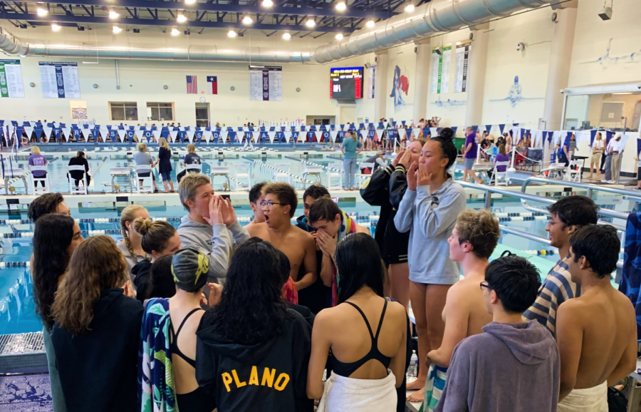 Senior+captains+Kendall+Pinkerton%2C+Gio+Linscheer+and+Megan+Lam+lead+the+team+cheer+during+the+FISD+TISCA+Dual+Meet+Champs+on+Nov.+12.
