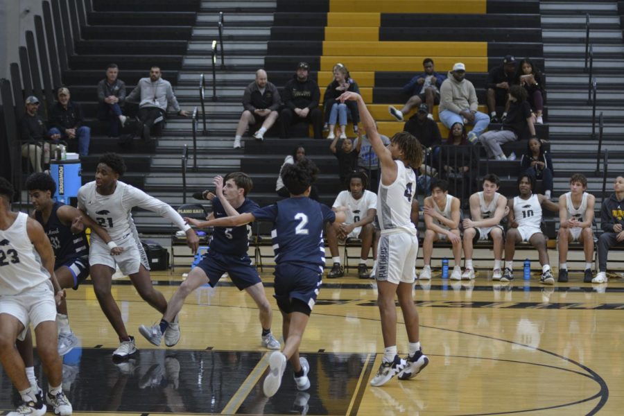 Junior Jordan Mizell throws a free throw after a foul from the opposing team at the varsity game versus Flower Mound on Jan. 20.